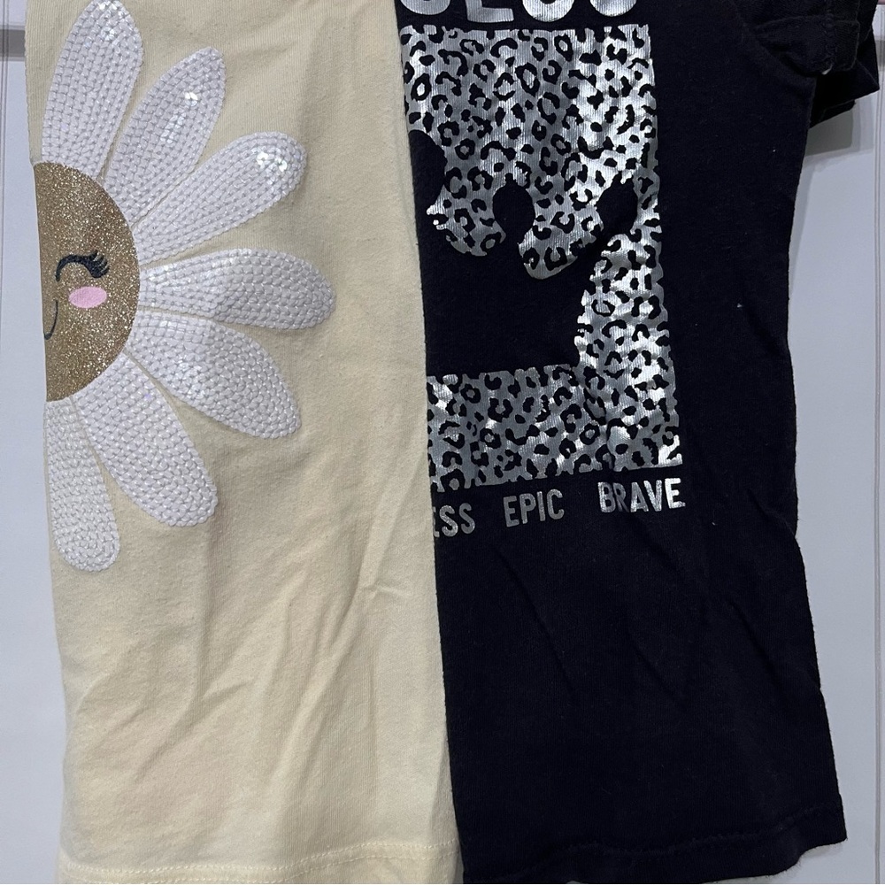 The children place short sleeve t shirt